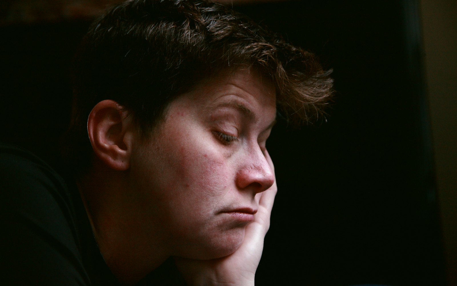 A man sitting in a church pew